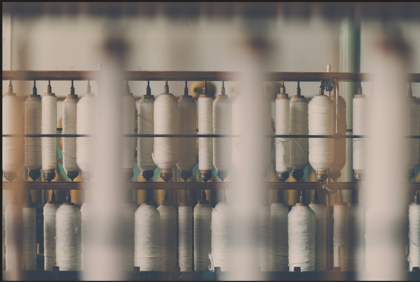 Textile spools showing quality cotton thread and production detail